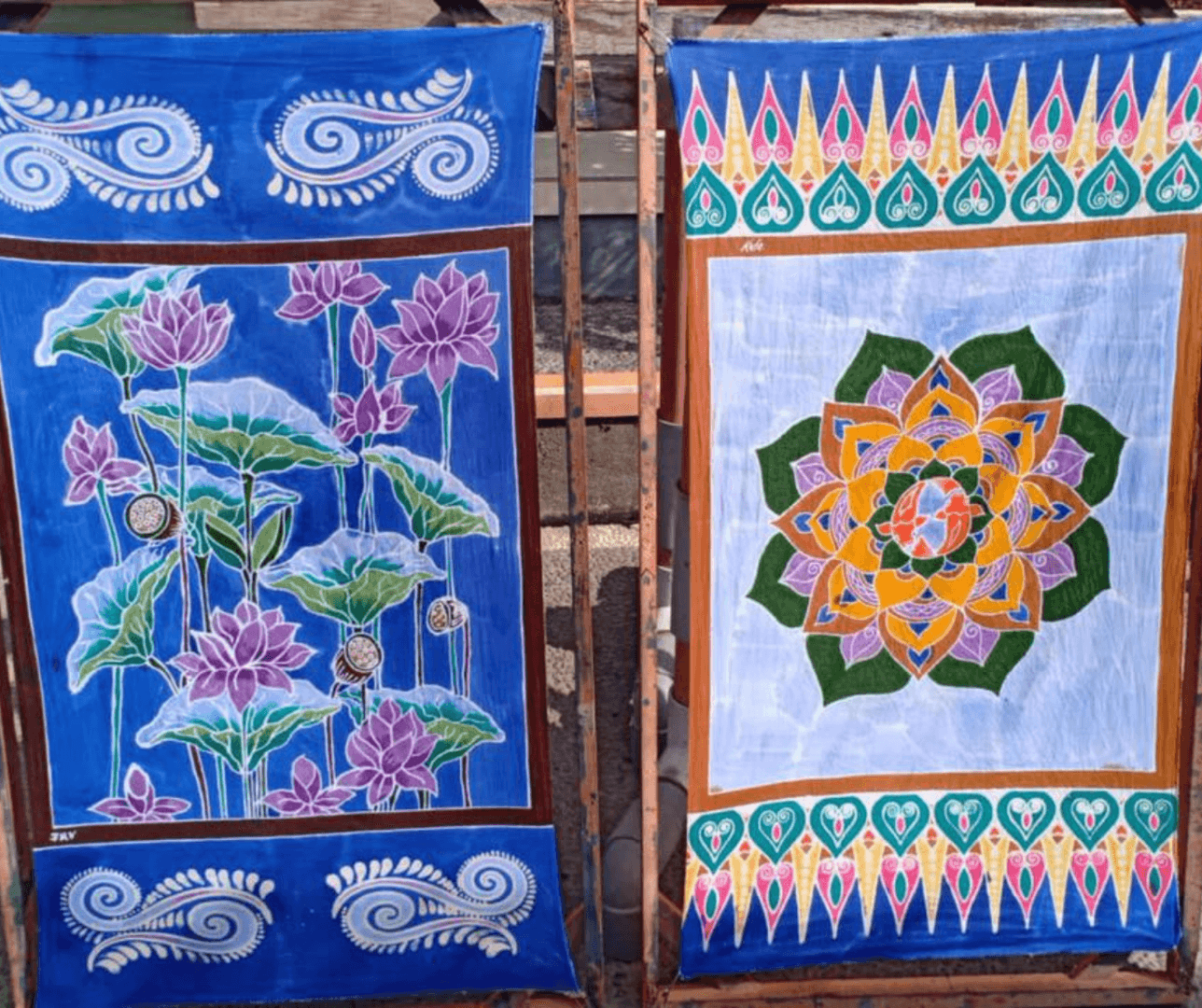 Women showing creating art in Bali retreat batik workshop